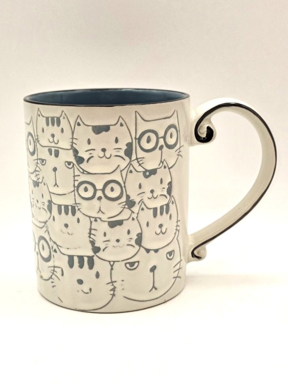 Spectrum Designz Embossed Kitty Cat Faces Repeat Coffee Mug Blue Interior 16 oz